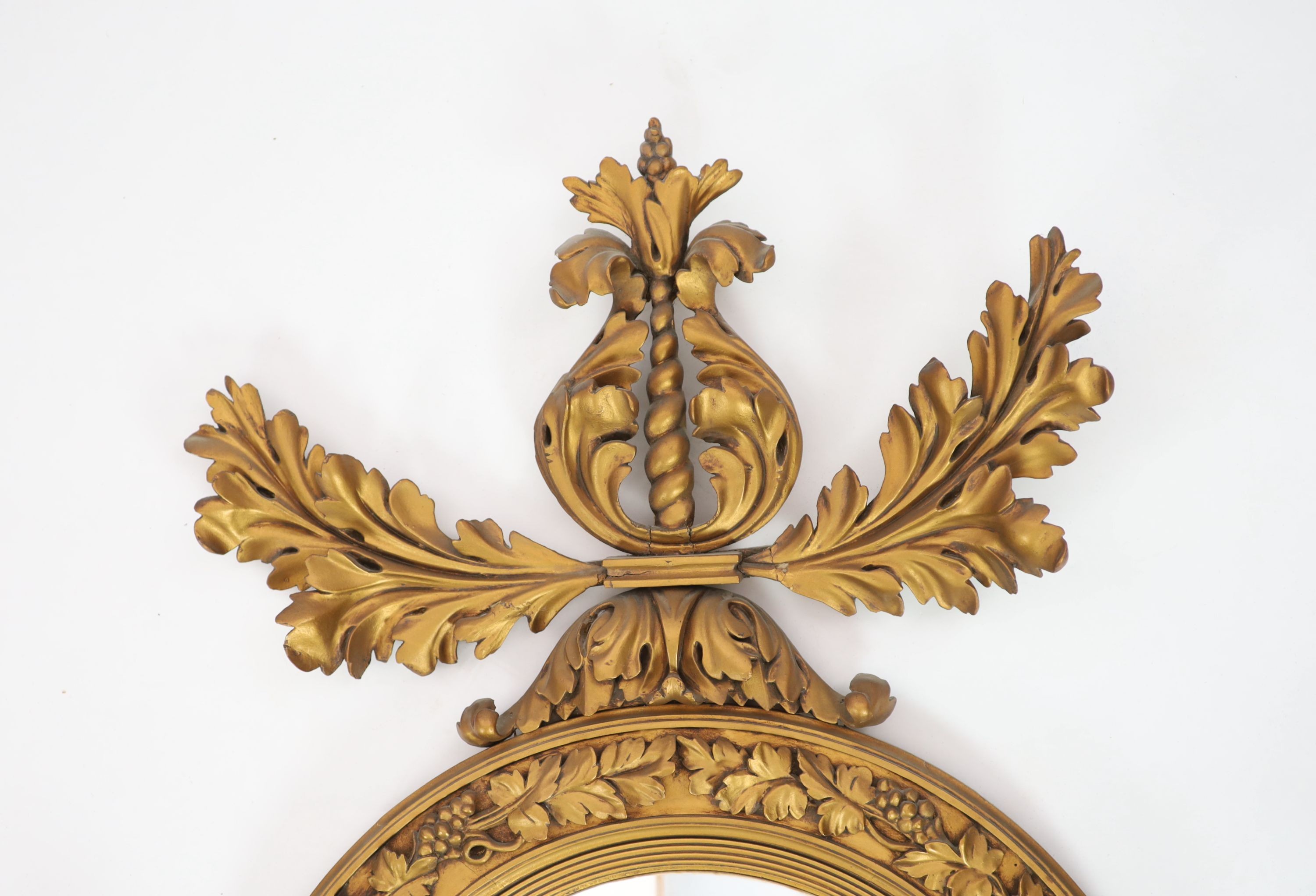 A William IV giltwood and gesso girandole W 78cm H 131cm